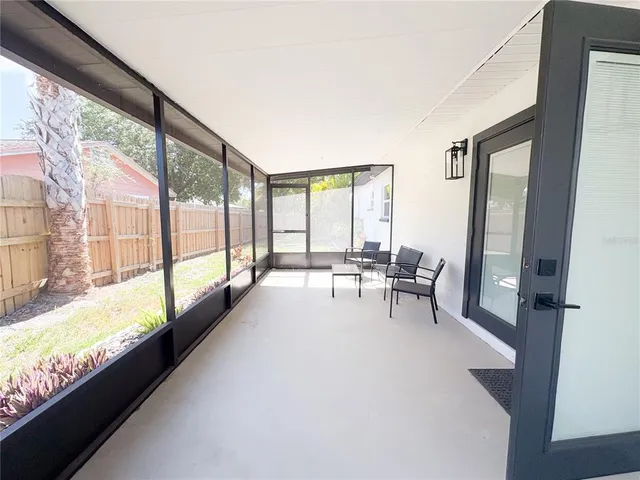 a view of a room with swimming pool