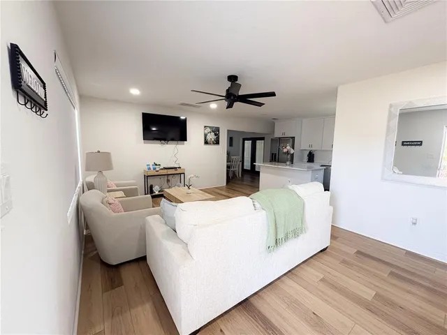 a bed room with bed and tv