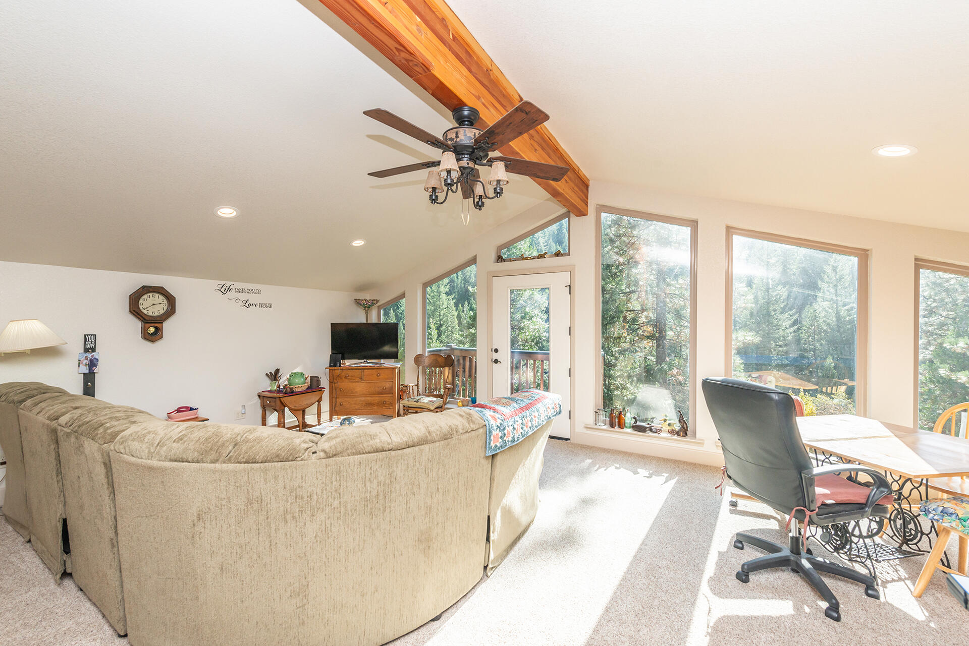 851 Mountain Aire Road Trinity Center, CA 96091 - Photo 28 of 54 a living room with furniture and a large window