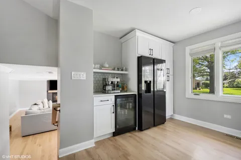 a kitchen with stainless steel appliances a refrigerator and a stove