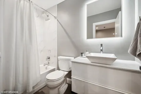 a view of a patio with a table and chairs