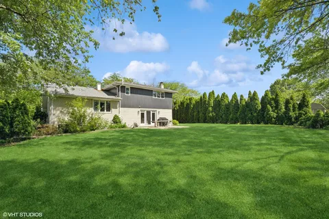 a picture of a park with a bench