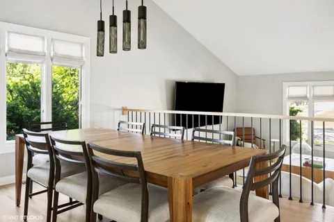 a view of a dining room with furniture
