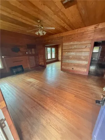 a view of livingroom with hardwood floor and hallway