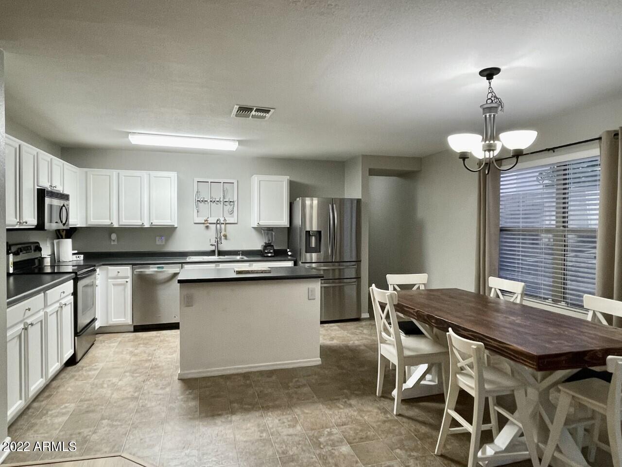 3345 South Bowman Road Apache Junction, AZ 85119 - Photo 8 of 37 Kitchen/Island/Dining