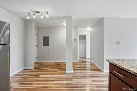 a view of a kitchen from the hallway