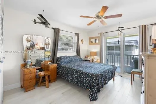 a bed room with furniture and a window