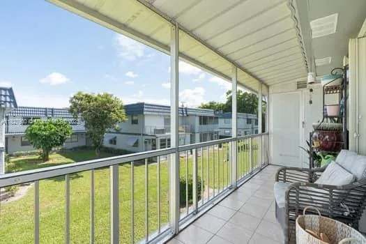 a view of balcony with a potted plant