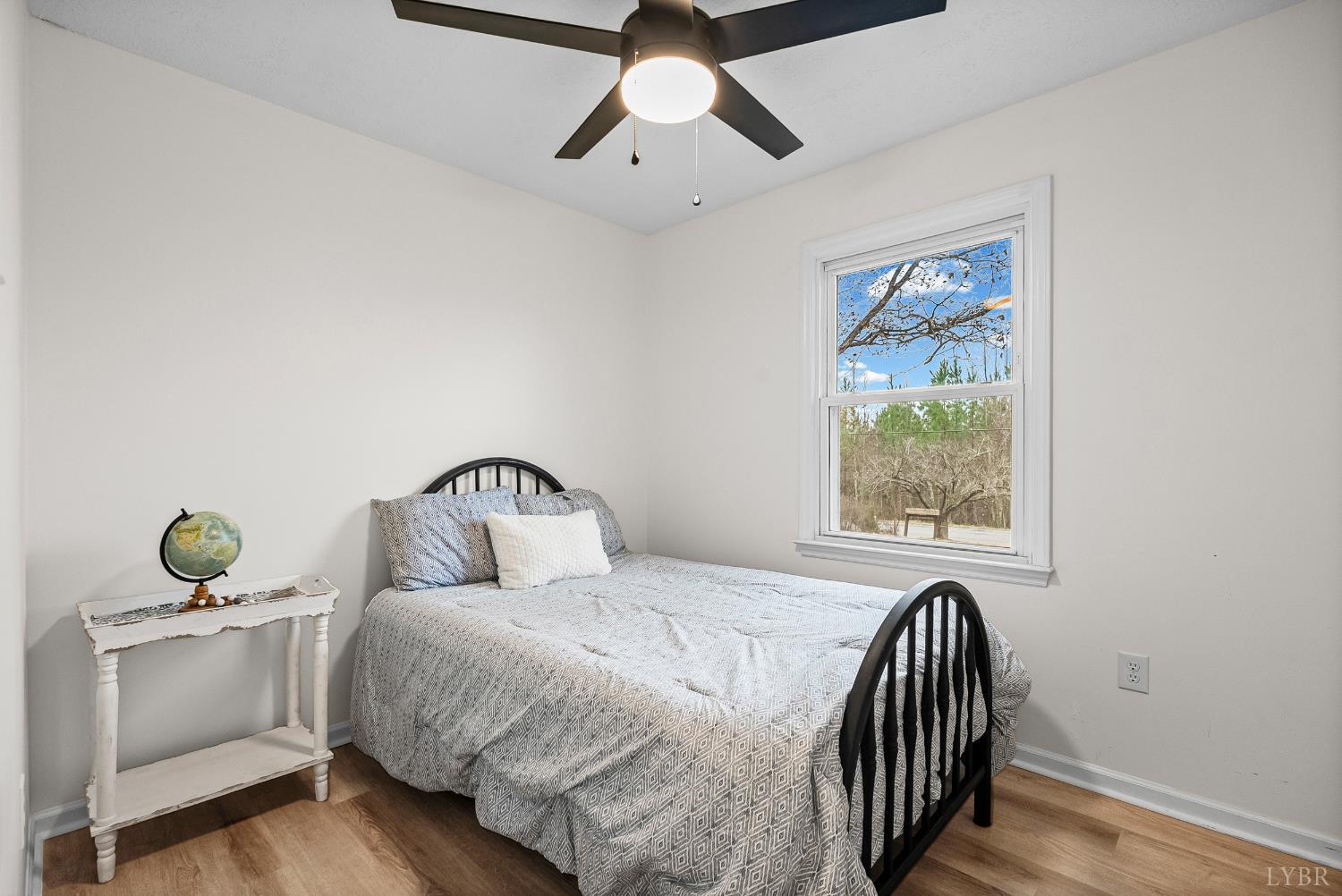 2622 Bethany Road Rustburg, VA 24588 - Photo 16 of 28 a bedroom with a bed and a window