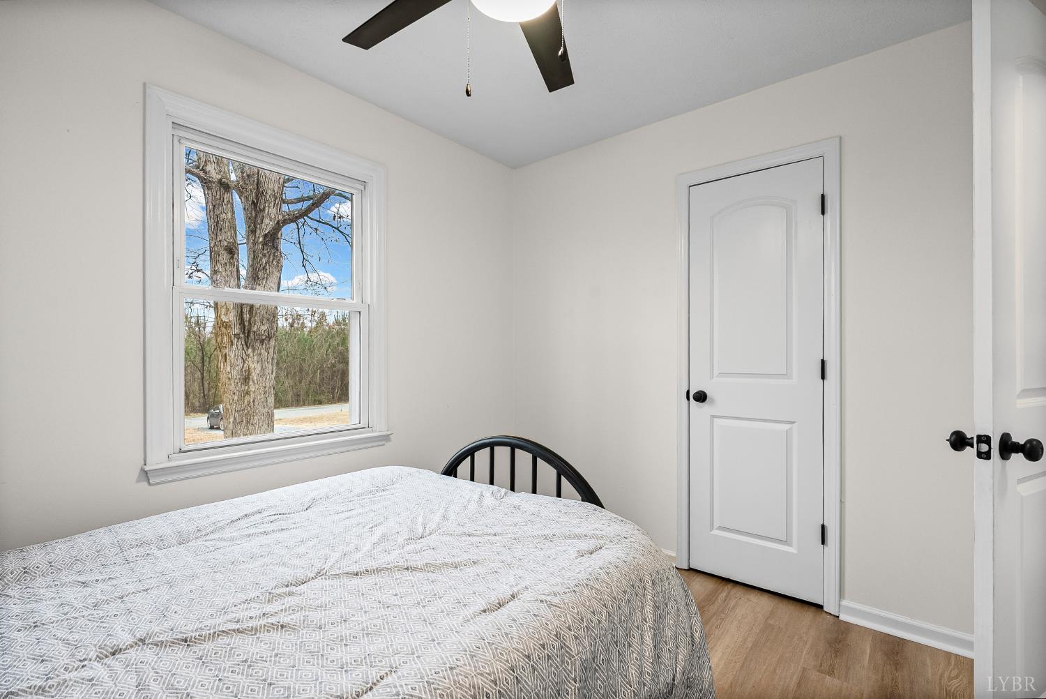 2622 Bethany Road Rustburg, VA 24588 - Photo 17 of 28 a bedroom with a bed and a window
