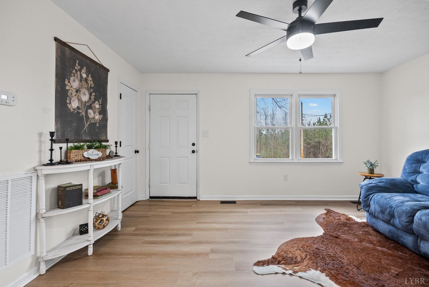 2622 Bethany Road Rustburg, VA 24588 - Photo 2 of 28 a living room with stainless steel appliances furniture and a window