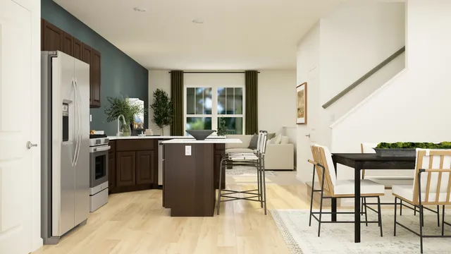 a dining room with furniture and a floor to ceiling window