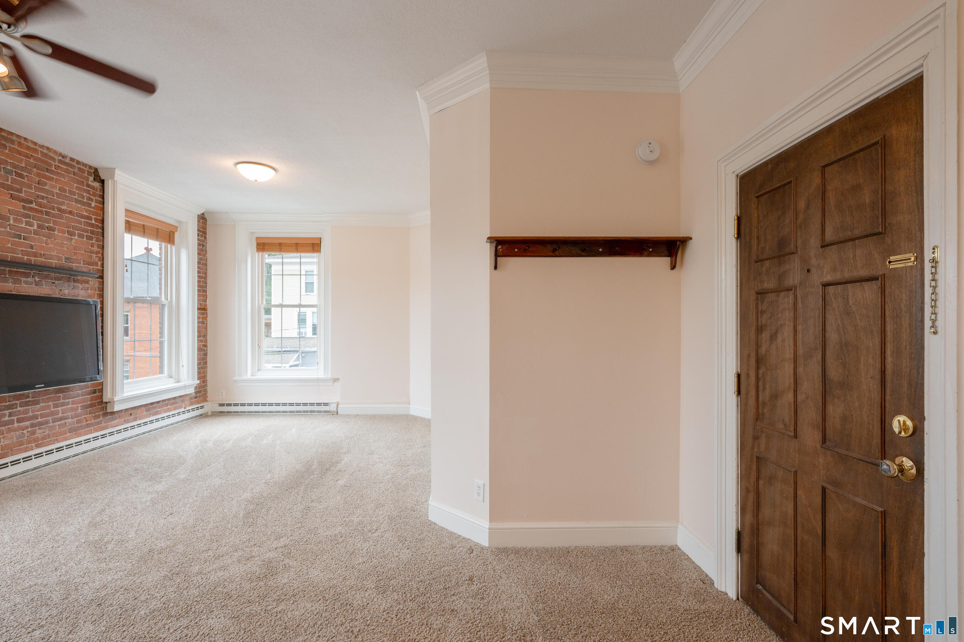 130 Main Street, Unit 2D Canton, CT 06019 - Photo 6 of 25 an empty room with windows