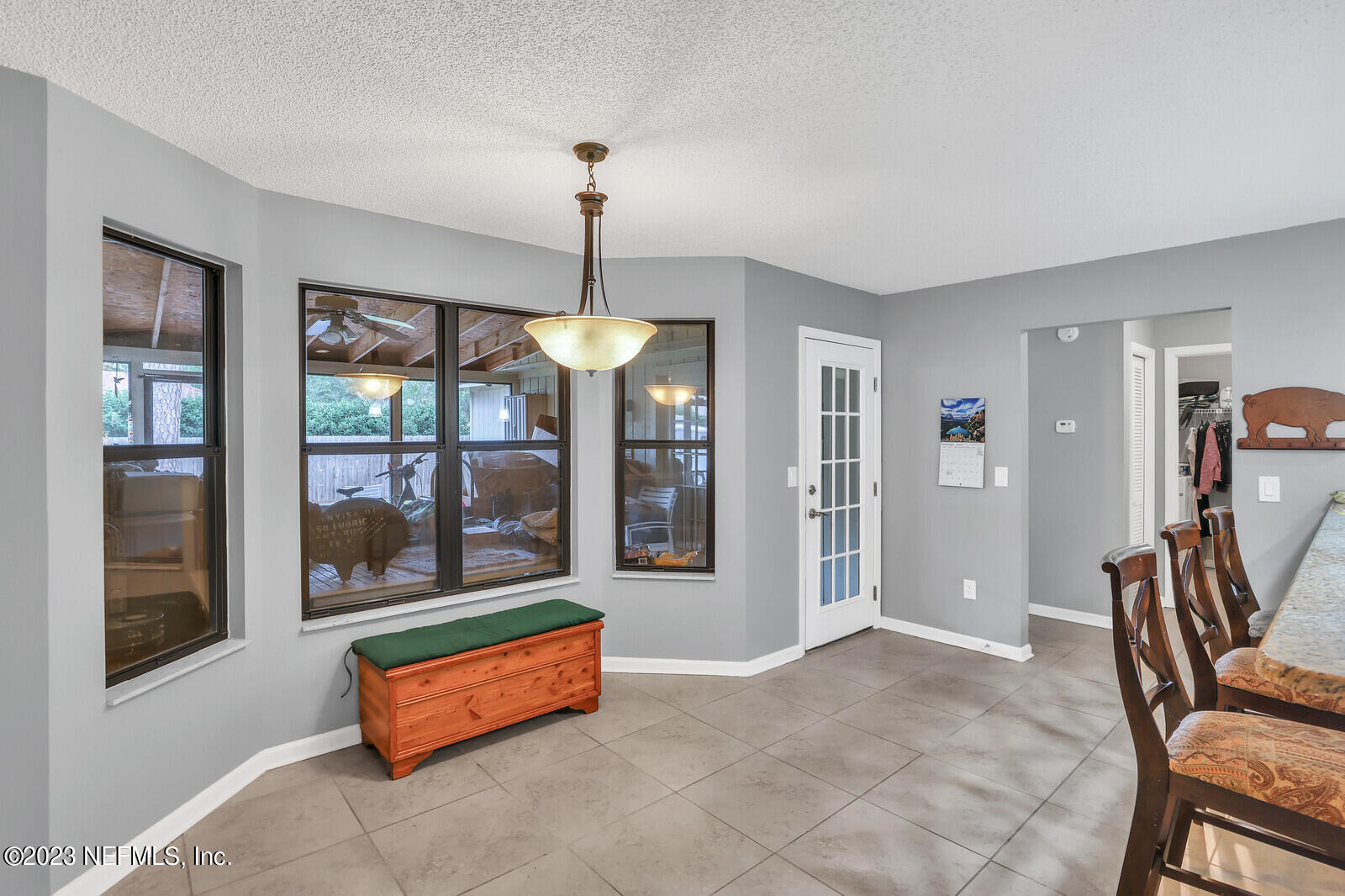 3001 Nautilus Road Middleburg, FL 32068 - Photo 18 of 26 a room with pool table and large windows