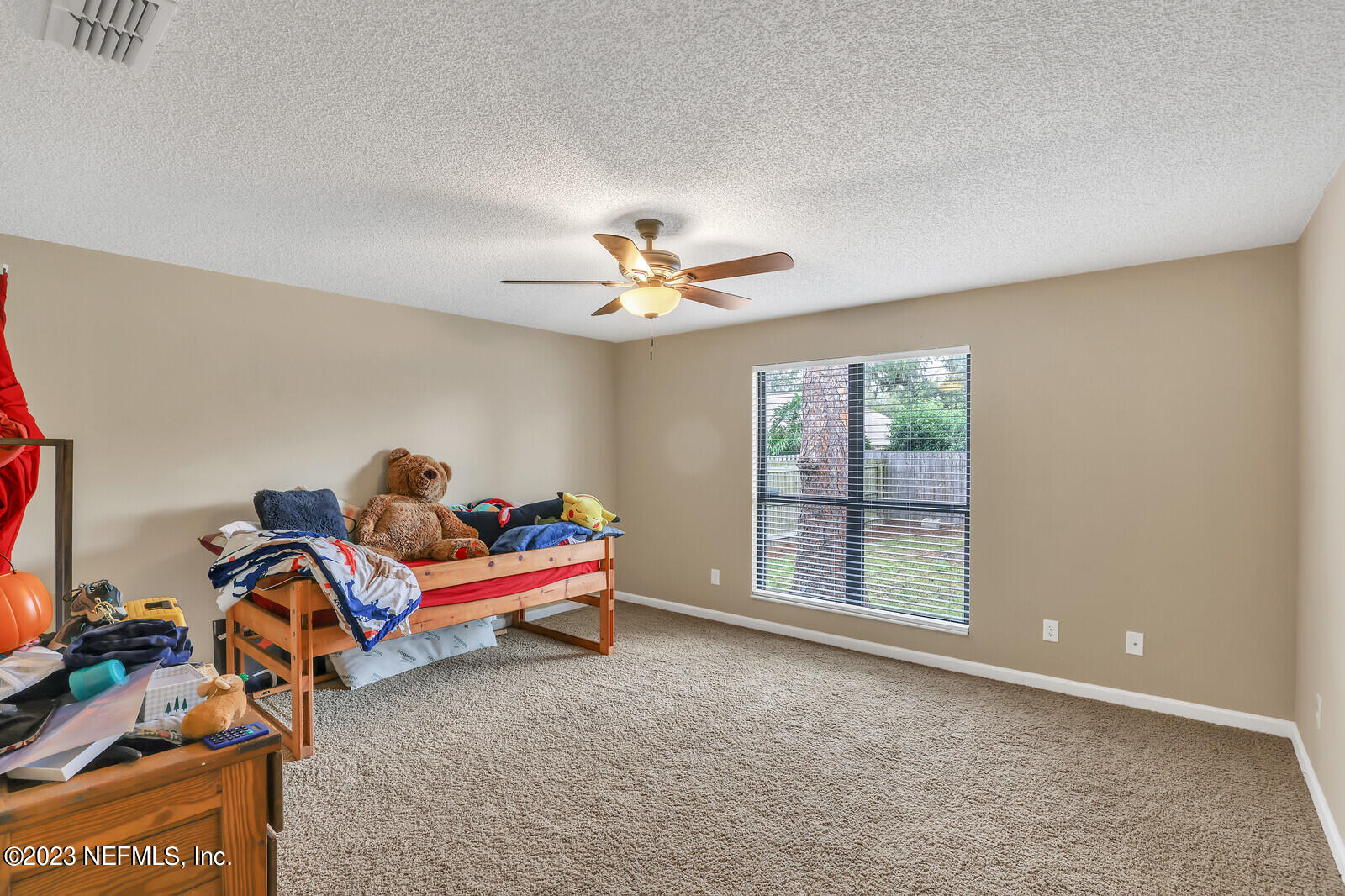 3001 Nautilus Road Middleburg, FL 32068 - Photo 25 of 26 a bed room with a bed and a window