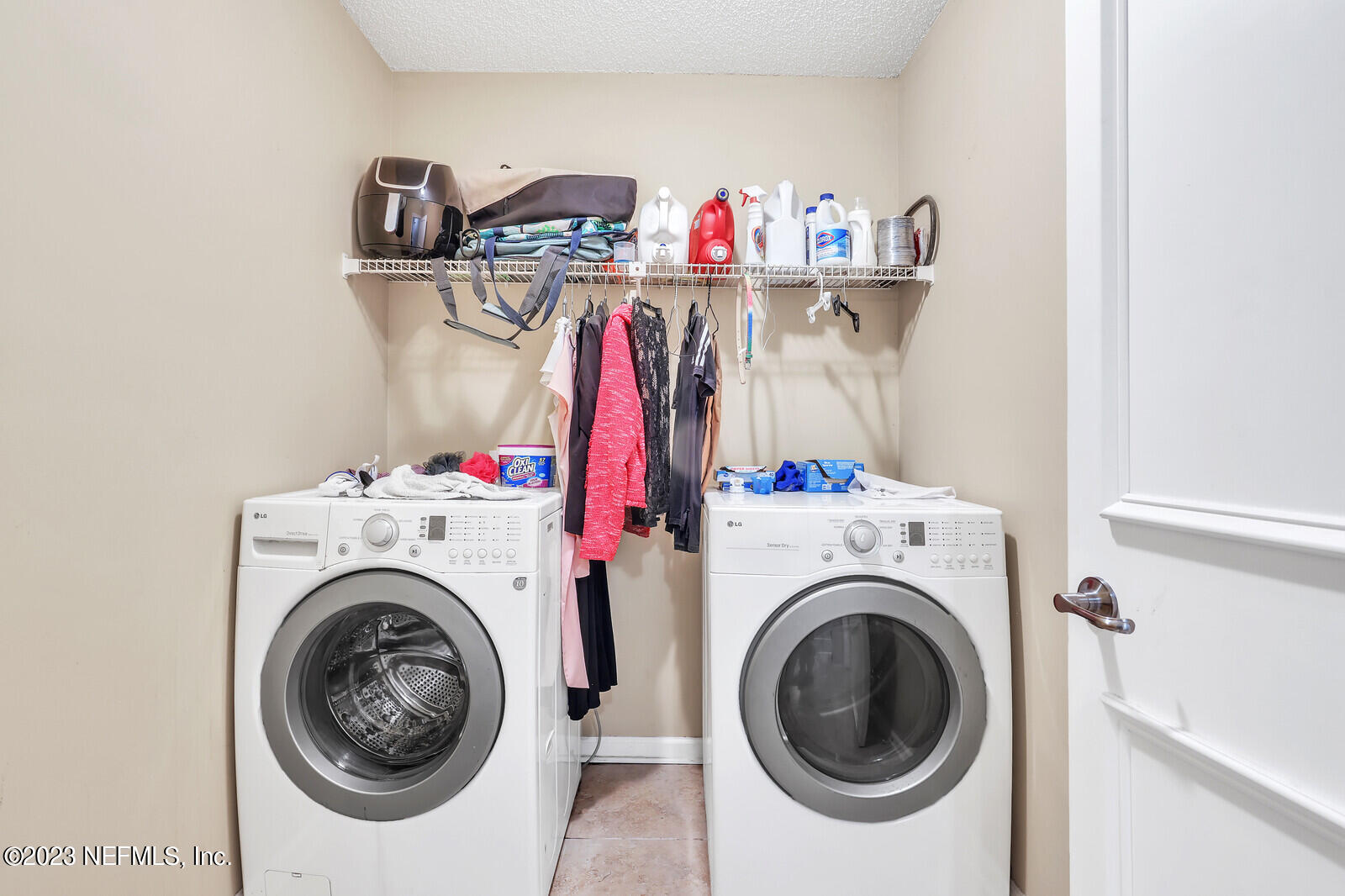 3001 Nautilus Road Middleburg, FL 32068 - Photo 26 of 26 a utility room with dryer and washer