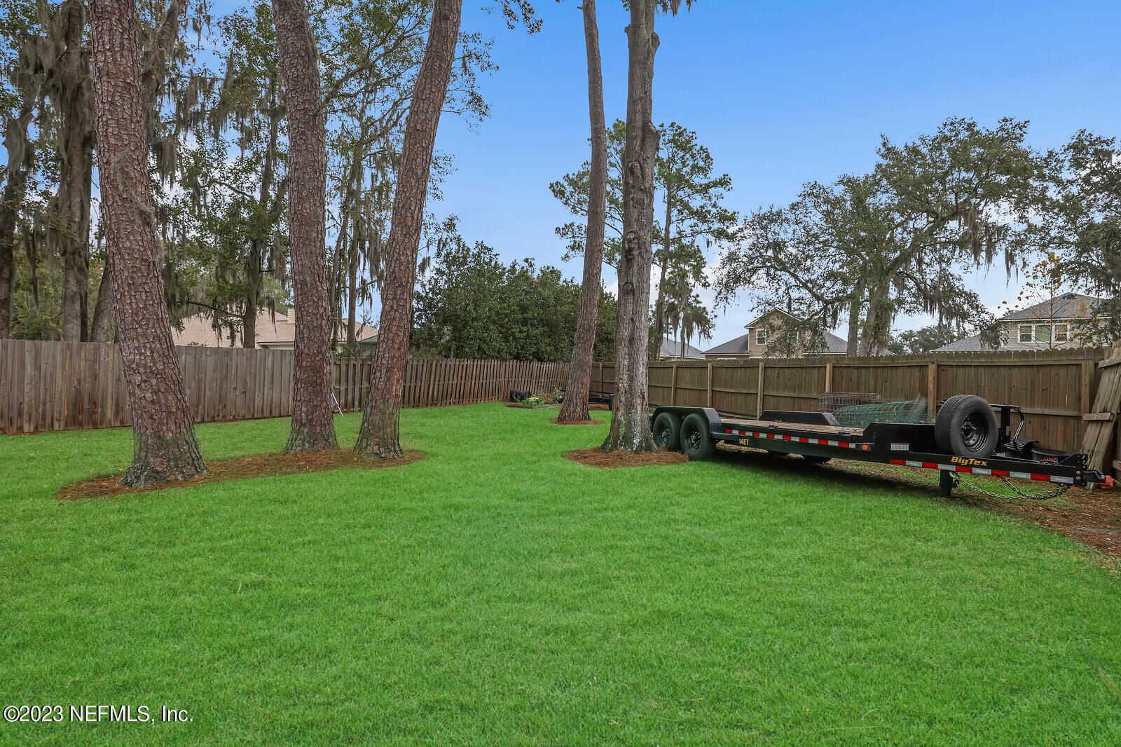 3001 Nautilus Road Middleburg, FL 32068 - Photo 3 of 26 a view of backyard with trampoline