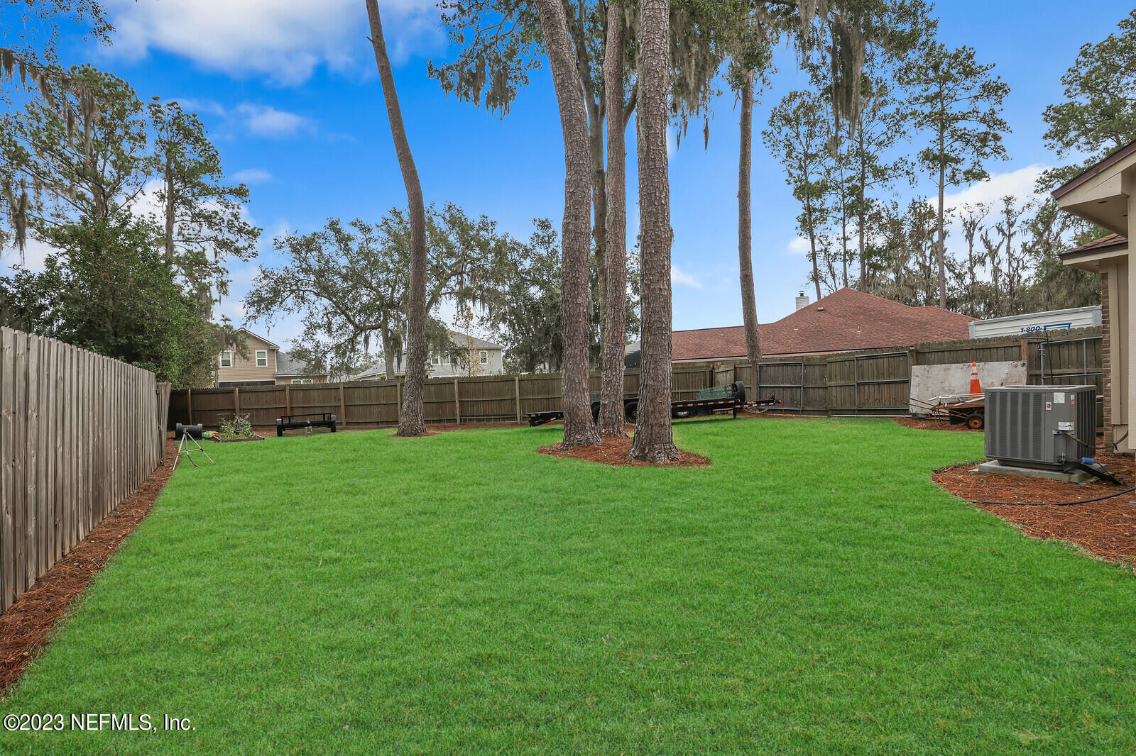 3001 Nautilus Road Middleburg, FL 32068 - Photo 4 of 26 a view of a backyard with large trees