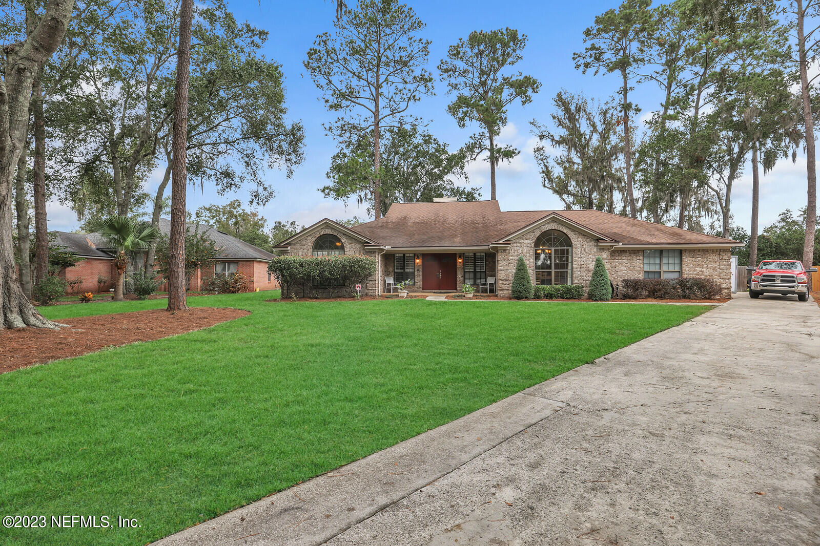 3001 Nautilus Road Middleburg, FL 32068 - Photo 8 of 26 a front view of a house with garden