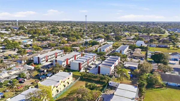 an aerial view of a city with lots of residential buildings