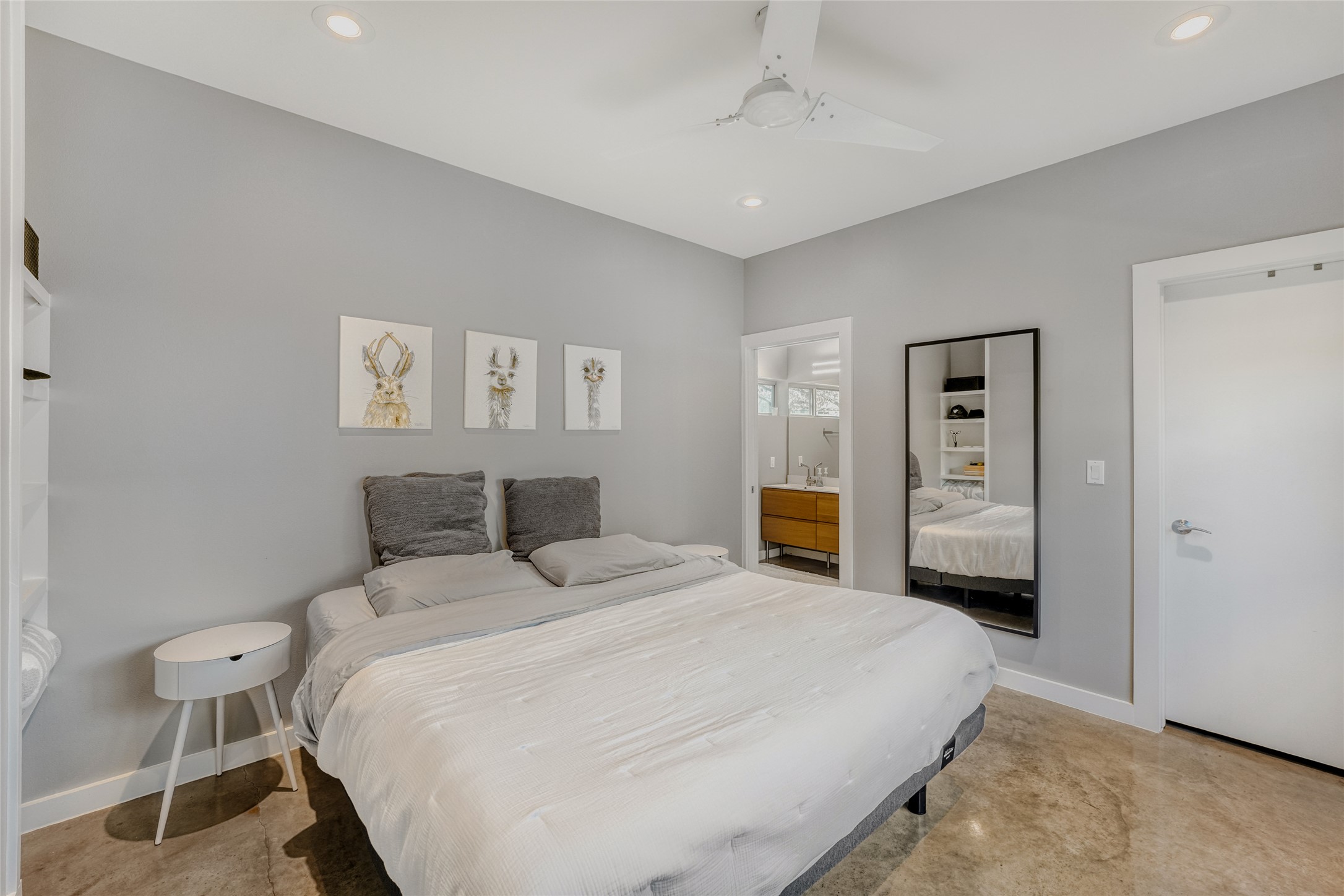 5909 Lux Street Austin, TX 78721 - Photo 14 of 28 Primary bedroom with recessed lighting and ceiling fan