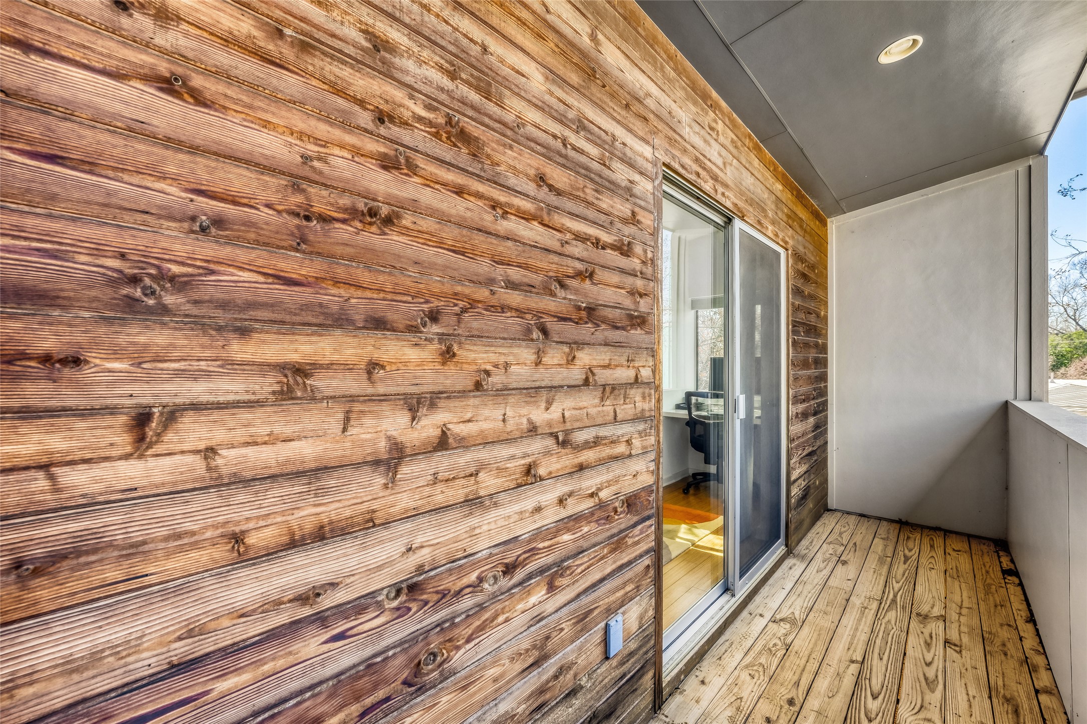 5909 Lux Street Austin, TX 78721 - Photo 18 of 28 View of 2nd floor balcony off of the SW Bedroom