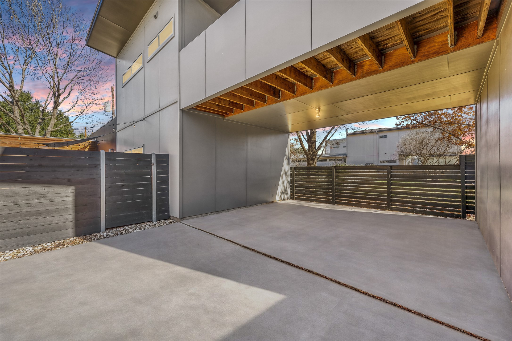 5909 Lux Street Austin, TX 78721 - Photo 6 of 28 Covered Carport at the rear of home