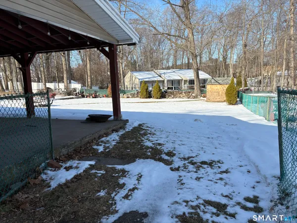 a view of a building with a yard