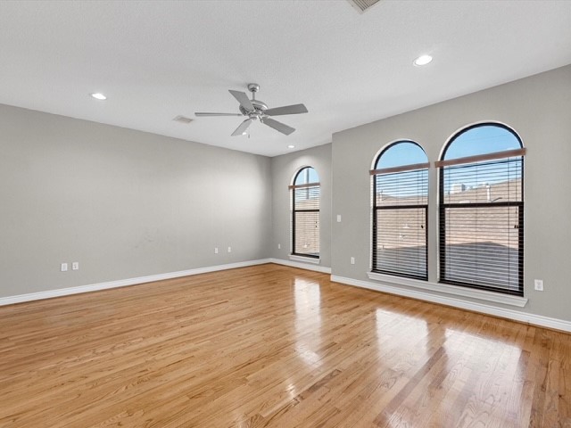 2505 Dallas Street Houston, TX 77003 - Photo 7 of 13 a view of empty room with wooden floor and fan