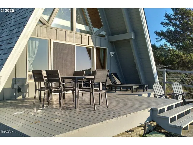 a view of dining room with furniture and wooden floor
