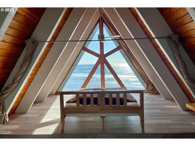 a view of wooden floor in a hall with wooden floor