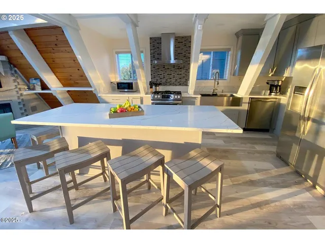 a view of a living room and dining room