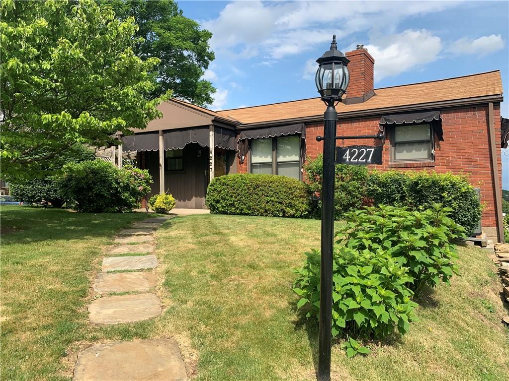 4227 Greenridge Road Pittsburgh, PA 15234 - Photo 2 of 23 Brick ranch home on corner lot with spacious yard.