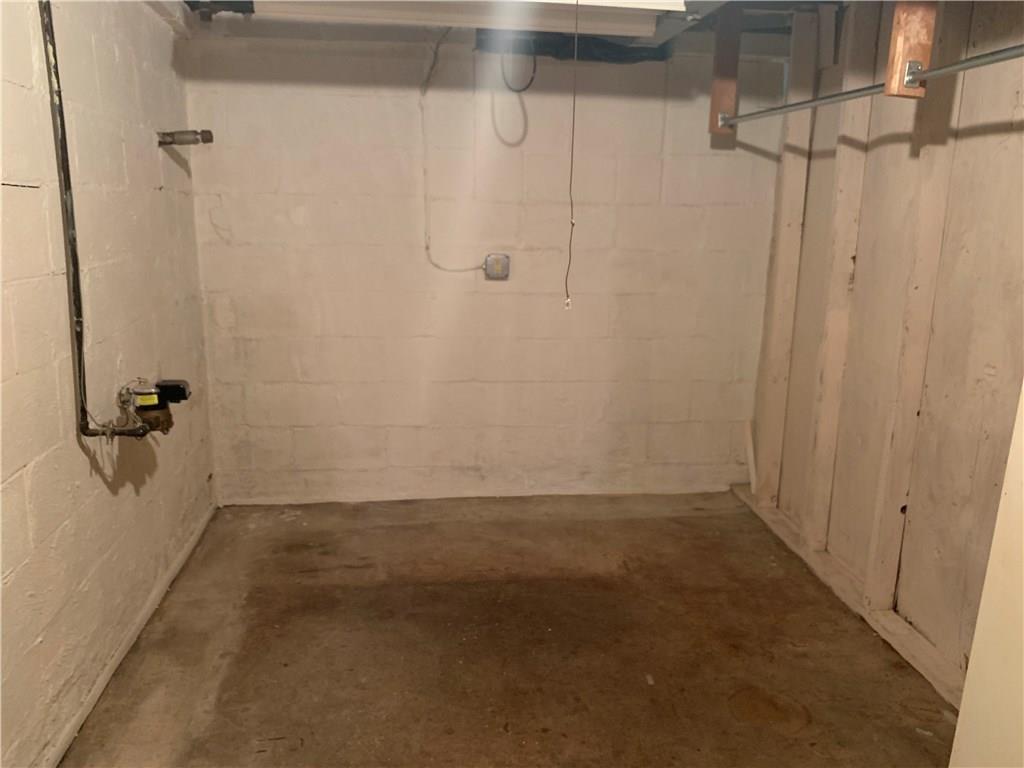 4227 Greenridge Road Pittsburgh, PA 15234 - Photo 15 of 23 LL BONUS ROOM can be used for office space, storage, exercise room, wine cellar, workshop, etc. Hanging rack for storing clothes/seasonal coats.