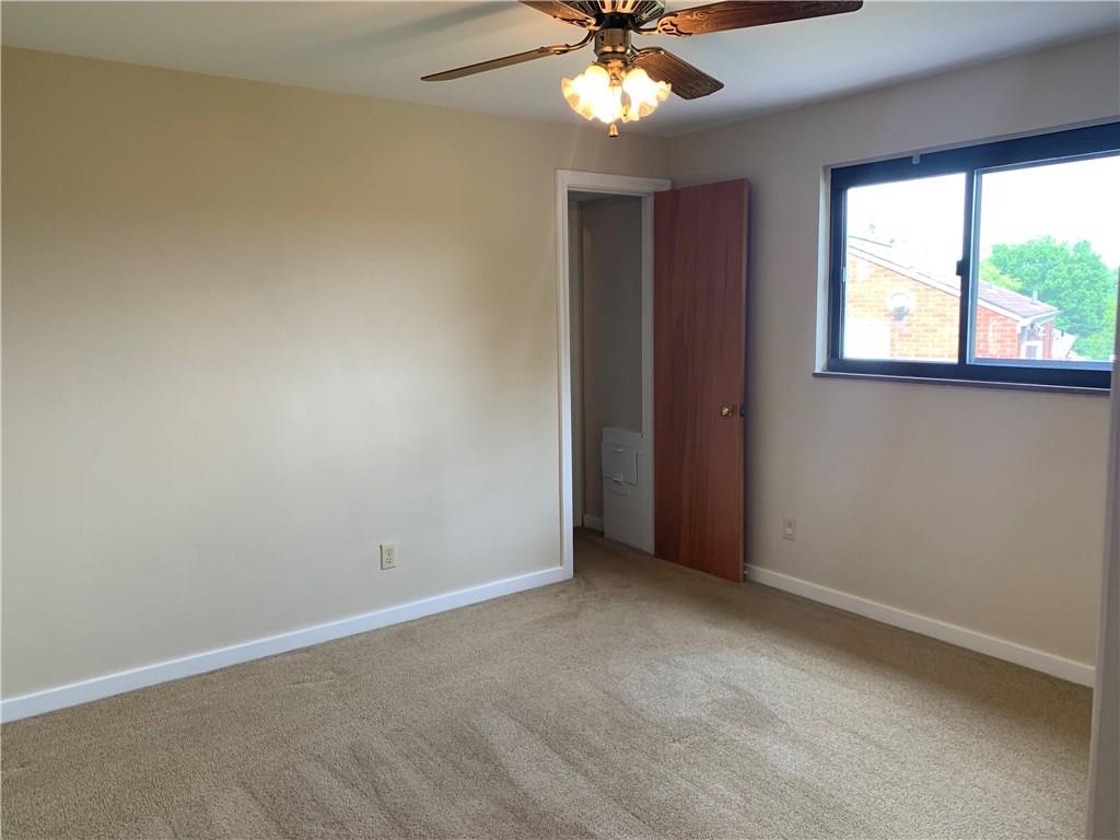 4227 Greenridge Road Pittsburgh, PA 15234 - Photo 6 of 23 Main bedroom with wall-to-wall carpeting and ceiling fan.