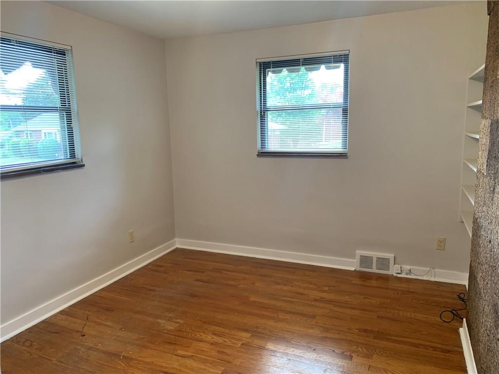 4227 Greenridge Road Pittsburgh, PA 15234 - Photo 7 of 23 2nd bedroom. Polished hardwood floors throughout.