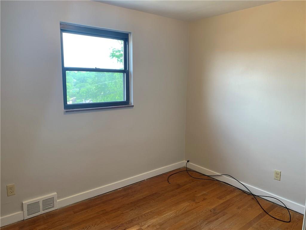 4227 Greenridge Road Pittsburgh, PA 15234 - Photo 8 of 23 3rd bedroom. Polished hardwood floors throughout.