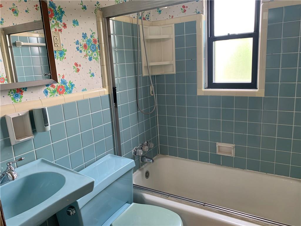4227 Greenridge Road Pittsburgh, PA 15234 - Photo 9 of 23 Ceramic Tile Tub Surround & Partial Ceramic Tiled Walls in Main Floor Full Bathroom.