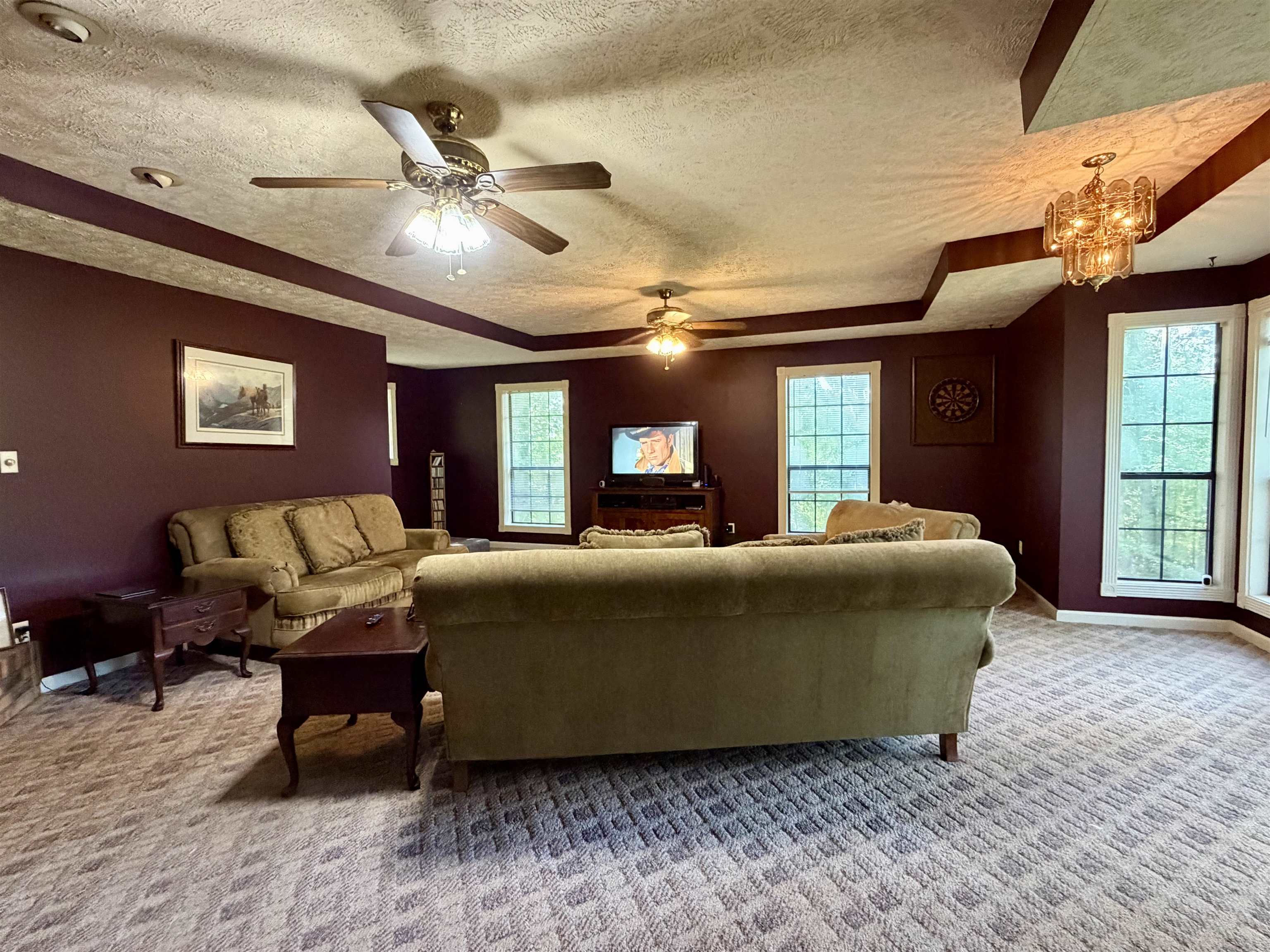 373 Clarence Barham Road Bethel Springs, TN 38315 - Photo 4 of 28 Spacious living area featuring textured ceilings, multiple windows, recessed lighting, and ceiling fans