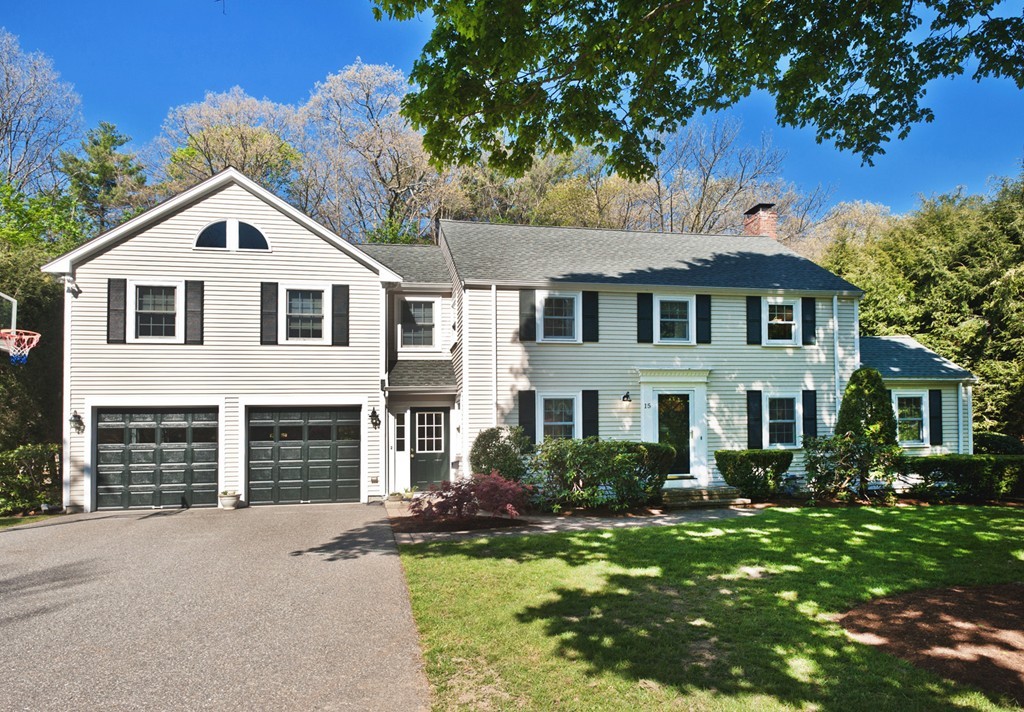 15 Jackson Road Wellesley, MA 02481 - Photo 1 of 27 a front view of a house with a garden