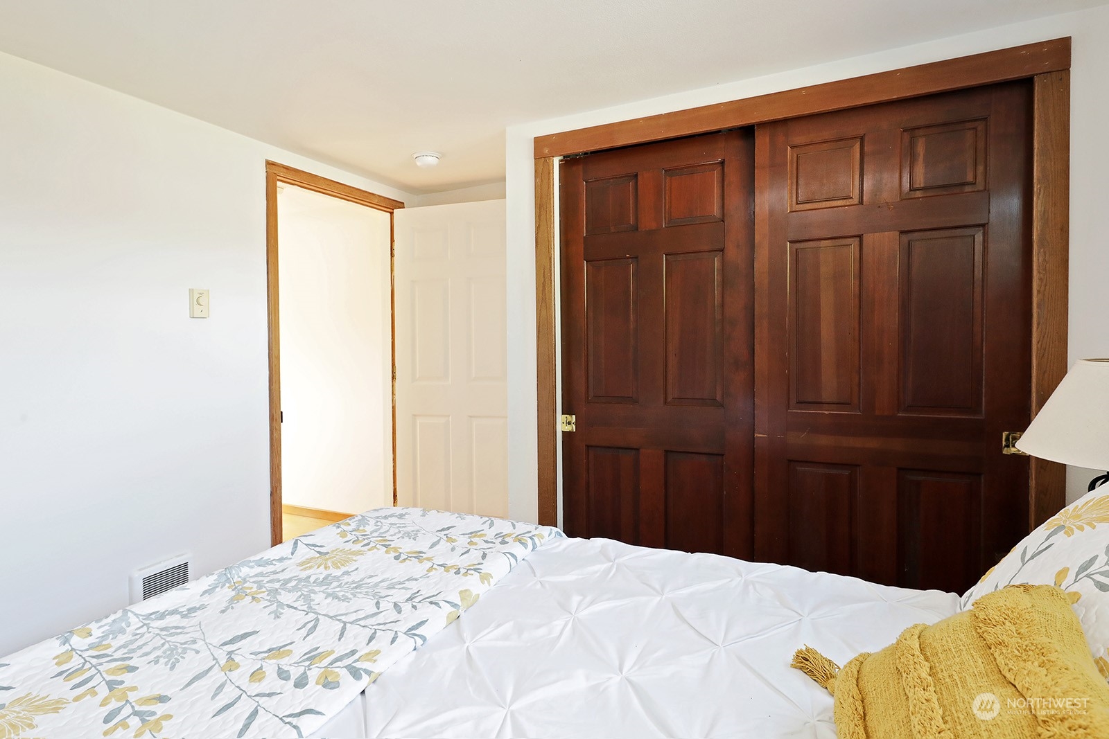 5612 Osprey Road Freeland, WA 98249 - Photo 15 of 29 a bed room with a bed and mirror
