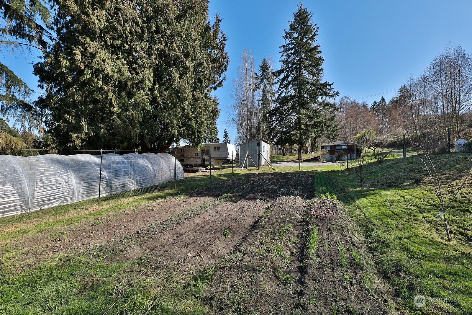 5612 Osprey Road Freeland, WA 98249 - Photo 21 of 29 a view of a lake with a yard