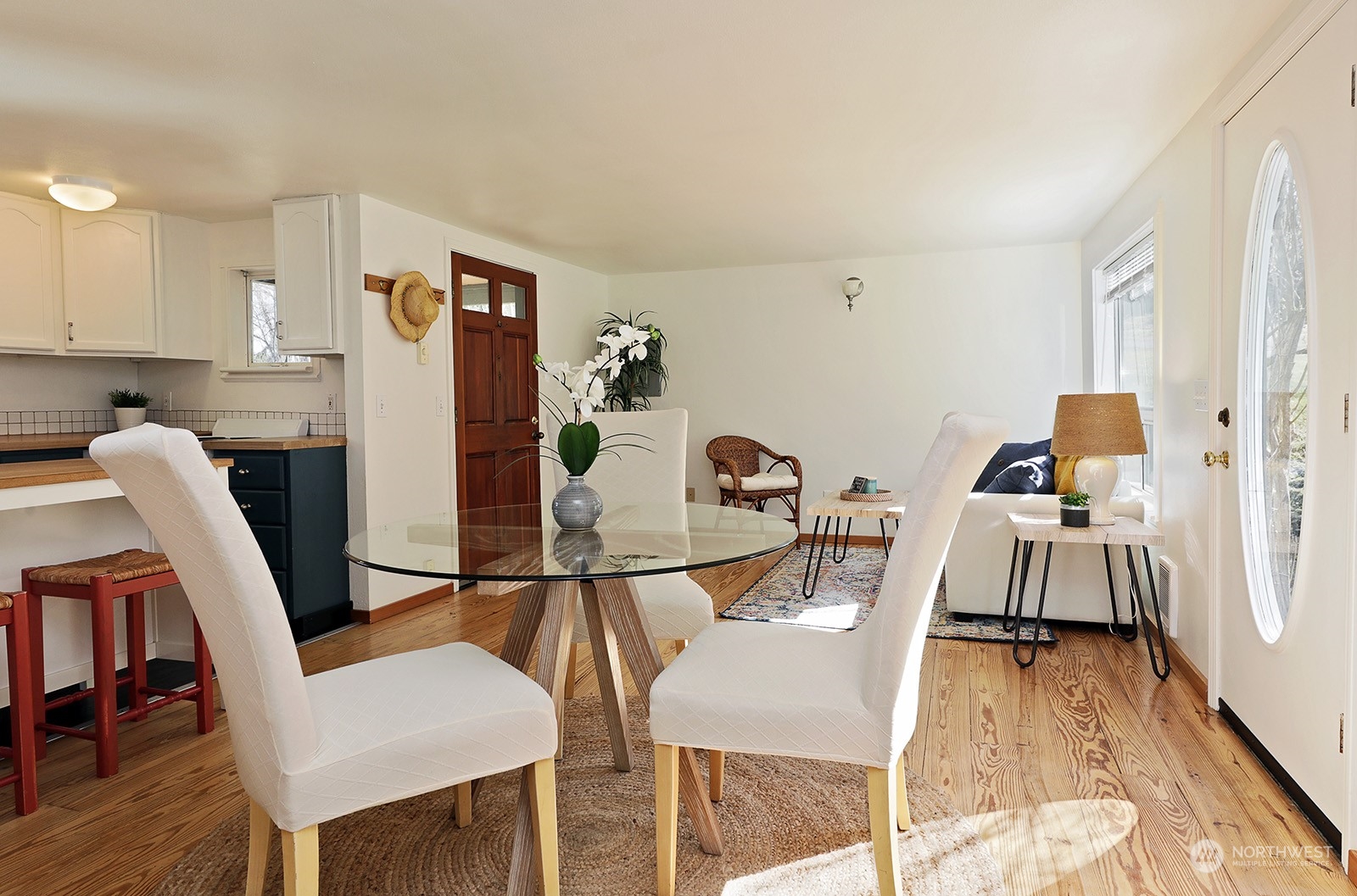 5612 Osprey Road Freeland, WA 98249 - Photo 7 of 29 a view of a dining room with furniture and wooden floor