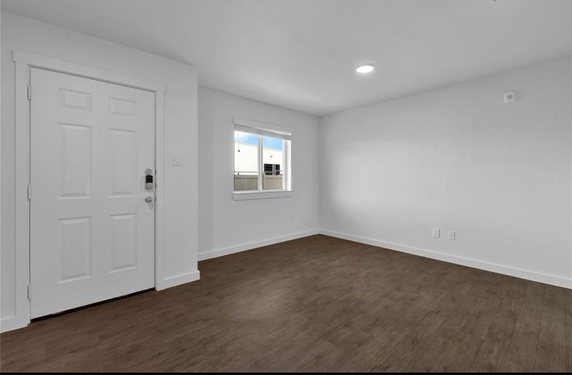 12603 Telge Road, Unit 23E Cypress, TX 77429 - Photo 3 of 25 an empty room with windows