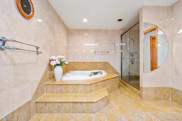 a front view of a house with a garage