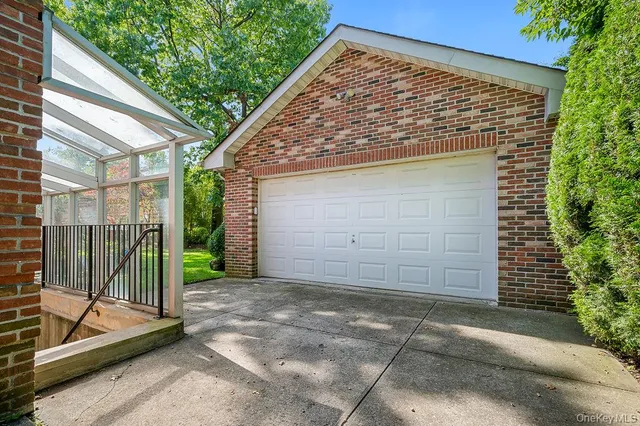 a view of house with patio outdoor seating