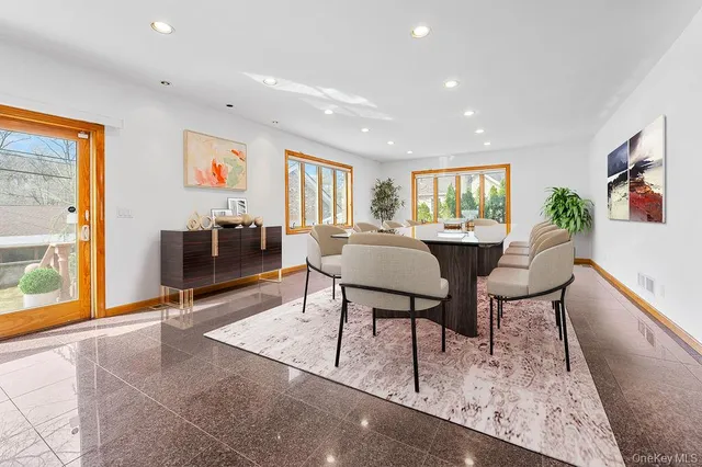 a view of a livingroom with furniture and window