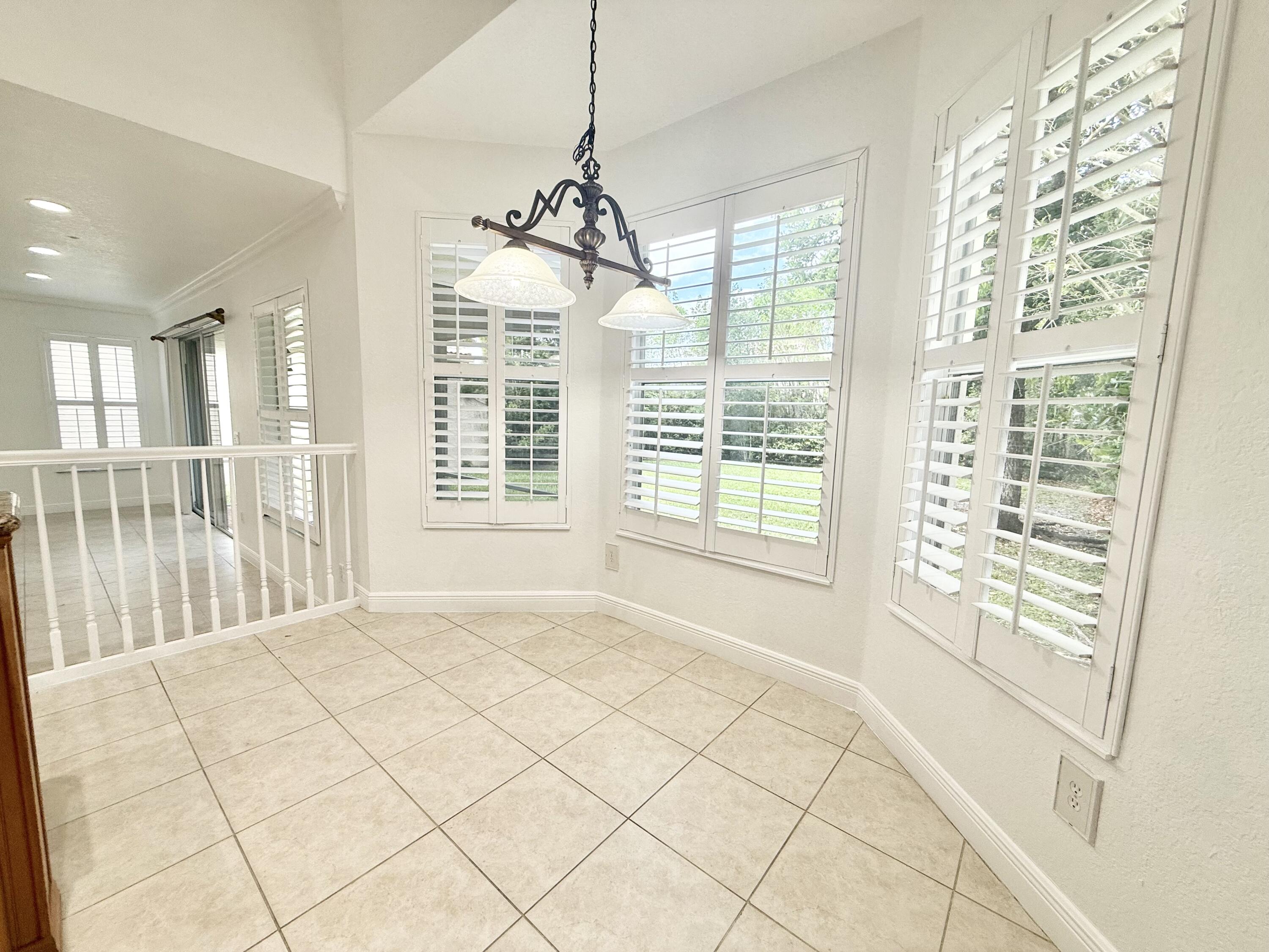 11553 Big Sky Court Boca Raton, FL 33498 - Photo 22 of 43 a view of an empty room with a window