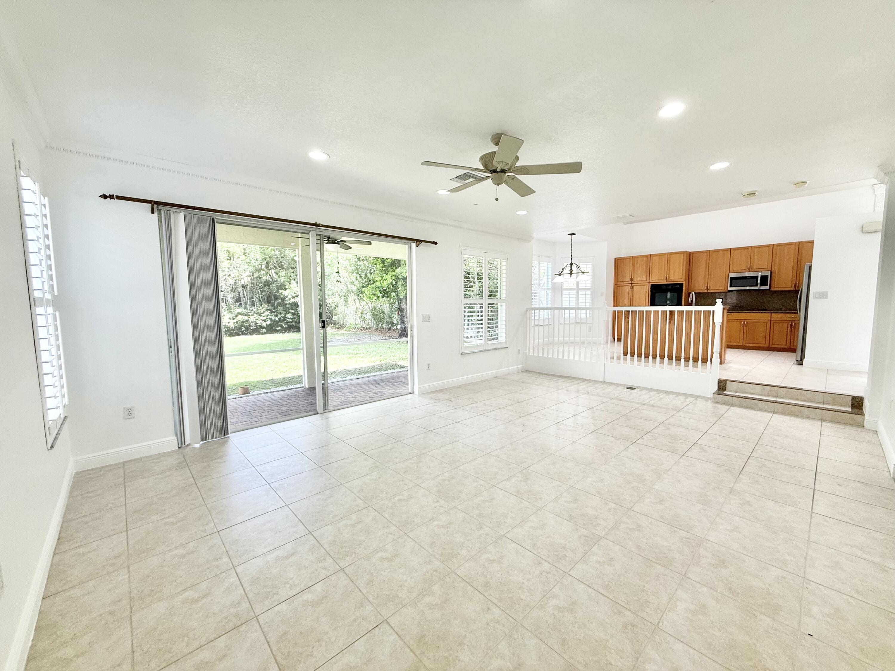11553 Big Sky Court Boca Raton, FL 33498 - Photo 4 of 43 a view of an empty room with a window