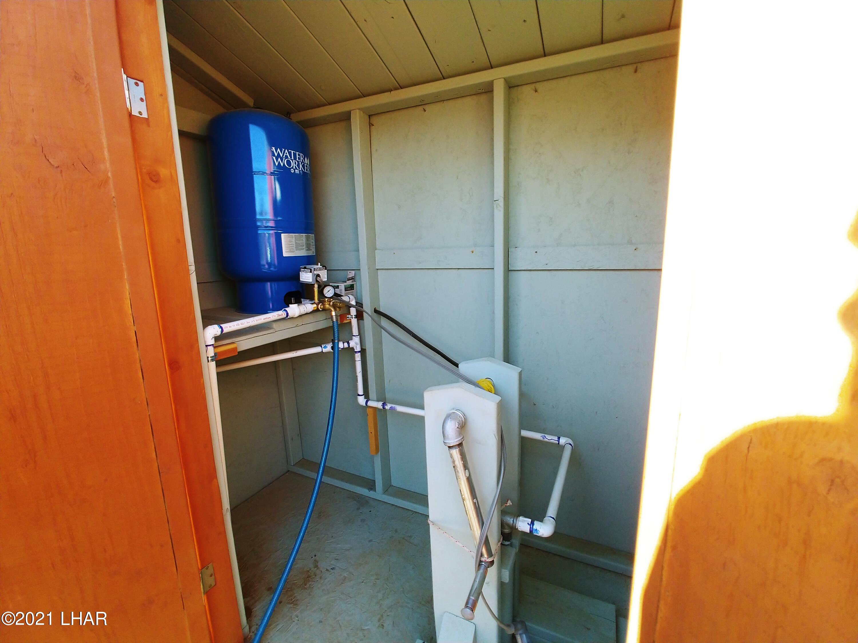 3288 D South Gold Mine Road Yucca, AZ 86438 - Photo 13 of 97 Water pump shed